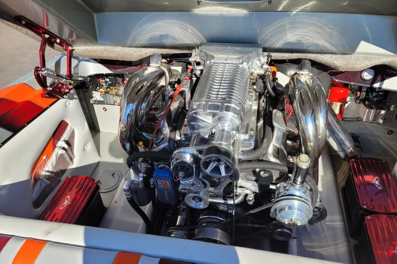 Slide: The Image of 2015 Cobra 260 Venom engine with polished components and intricate detailing. - 6