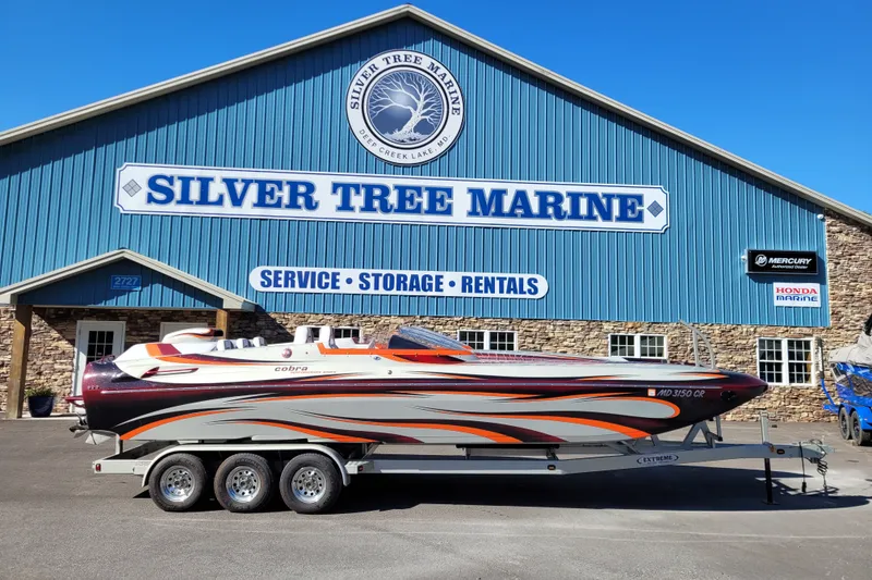 Slide: The Image of 2015 Cobra 260 Venom boat on trailer at Silver Tree Marine facility. - 4