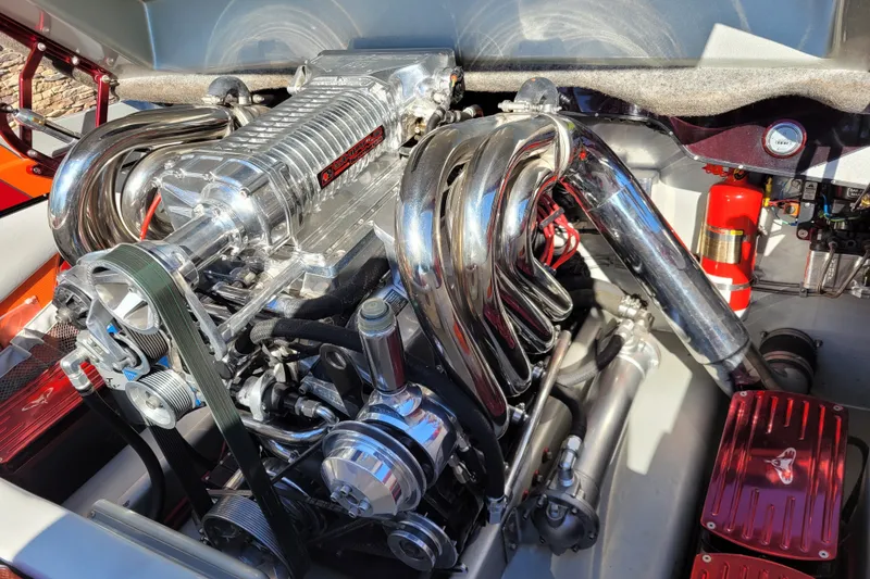 Slide: The Image of 2015 Cobra 260 Venom engine with polished chrome components and supercharger. - 7