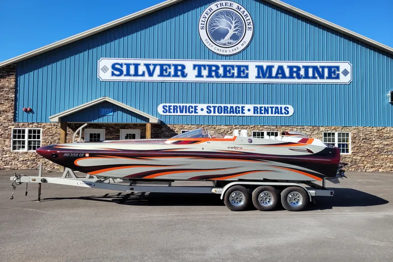 The Image of 2015 Cobra 260 Venom boat on trailer at Silver Tree Marine facility. - 0