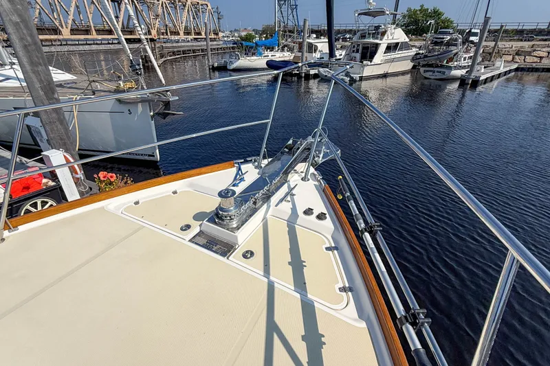 Slide: The Image of Bow view of 2007 Sabre 52 Salon Express yacht docked at marina. - 47