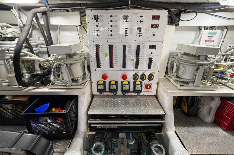 Slide: The Image of Engine room of 2007 Sabre 52 Salon Express with control panel and equipment. - 63