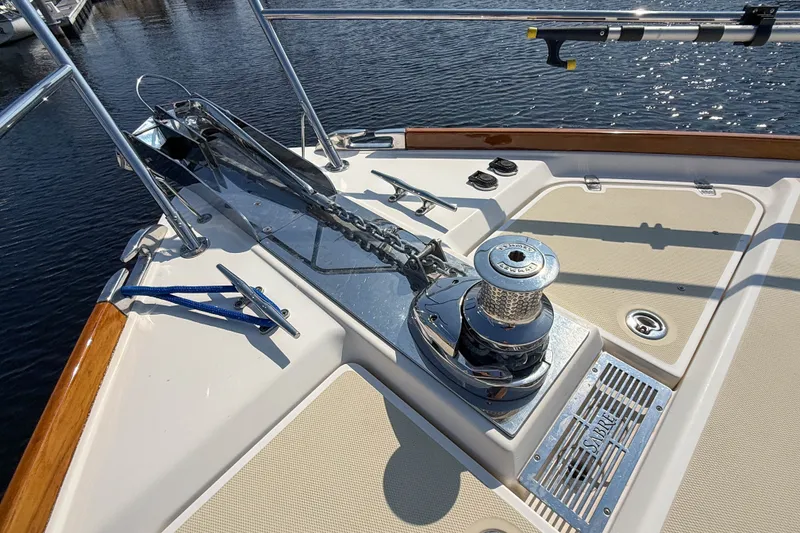 Slide: The Image of Bow of 2007 Sabre 52 Salon Express yacht with anchor and winch system. - 53