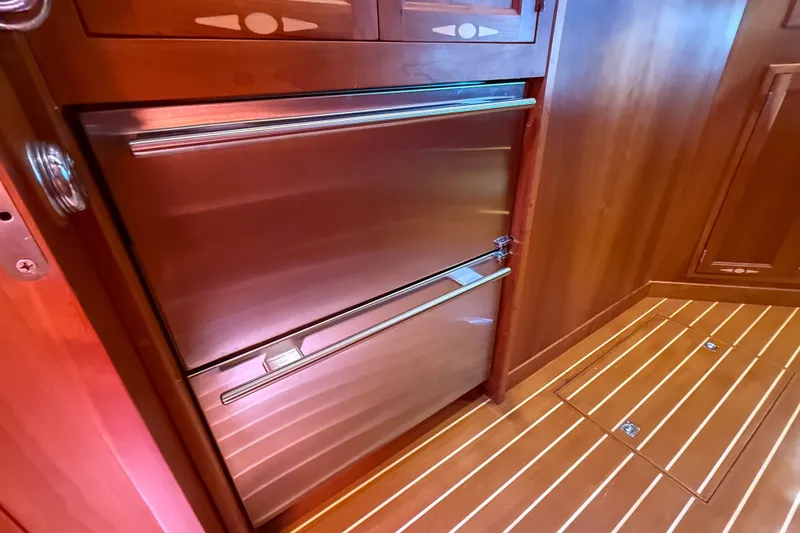 Slide: The Image of Stainless steel refrigerator in 2007 Sabre 52 Salon Express yacht interior. - 28