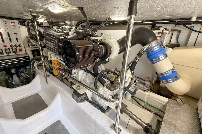 Slide: The Image of Engine room of a 2007 Sabre 52 Salon Express yacht, featuring CAT marine engine. - 57