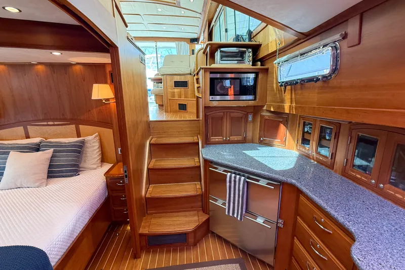 Slide: The Image of Luxurious interior of 2007 Sabre 52 Salon Express yacht with wood finishes and modern amenities. - 29
