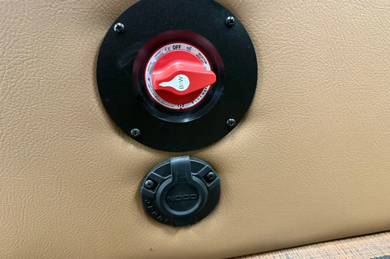 Slide: The Image of Battery switch and NOCO plug on 2026 Bentley Pontoons Elite 253 Swingback. - 13