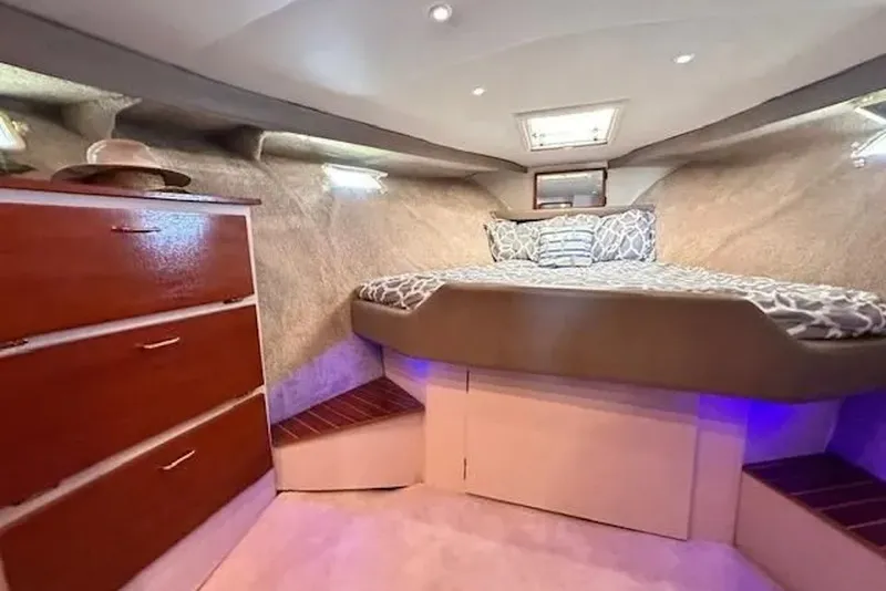 Slide: The Image of Interior cabin of 1981 Ocean Yachts 42 Super Sport with bed and storage drawers. - 18