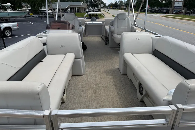 Slide: The Image of 2021 Avalon 2280 Venture Quad Lounger pontoon boat with spacious seating and modern design. - 10