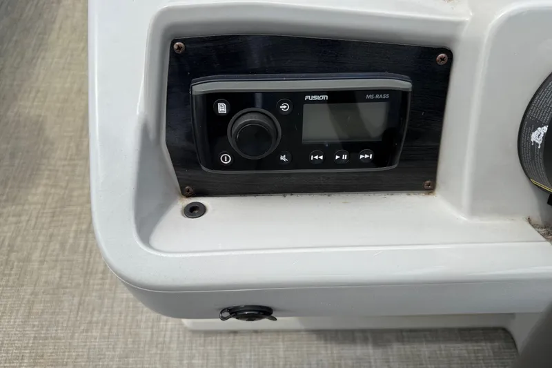 Slide: The Image of Fusion MS-RA55 stereo system on 2021 Avalon 2280 Venture Quad Lounger boat console. - 16