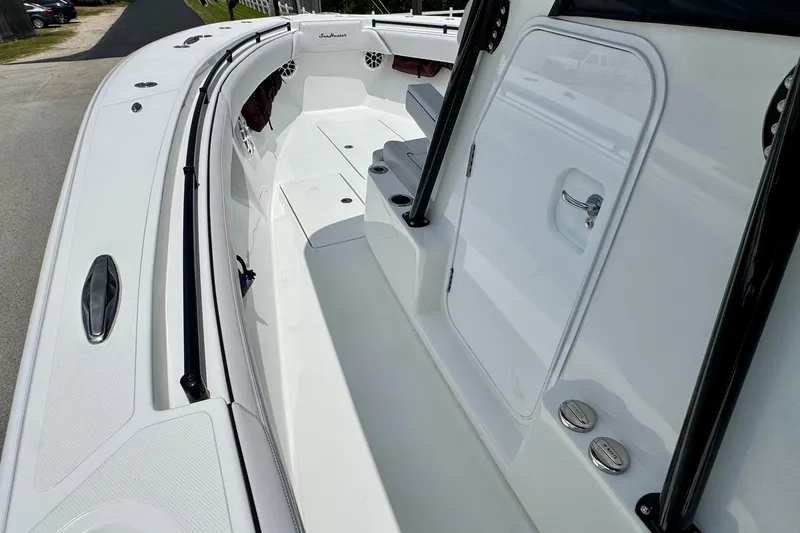 Slide: The Image of 2024 SeaHunter 33 Tournament boat interior, showcasing sleek design and spacious deck layout. - 14