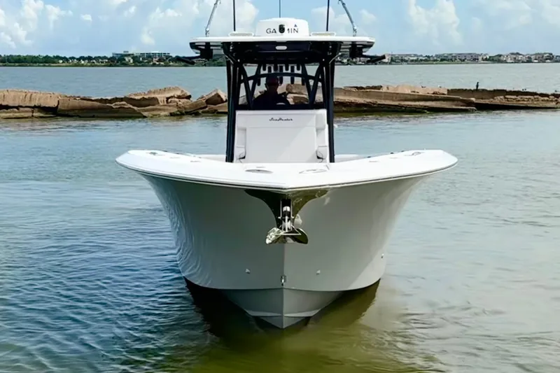 Slide: The Image of 2024 SeaHunter 33 Tournament boat on calm water, showcasing sleek design and advanced features. - 30