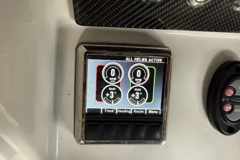 Slide: The Image of Digital display on 2021 Sea Cat 260 boat showing helm controls and settings. - 19