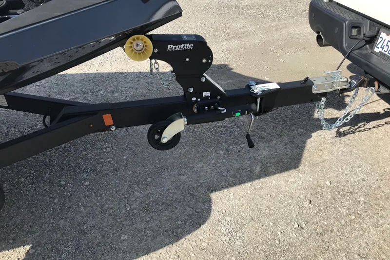 Slide: The Image of Trailer hitch of 2027 Lund 1875 Renegade boat attached to a vehicle. - 15