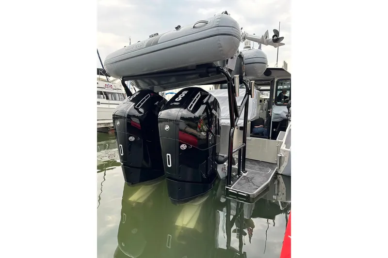 Slide: The Image of 2023 Life Proof 41 full cabin boat with dual outboard motors and inflatable dinghy. - 48