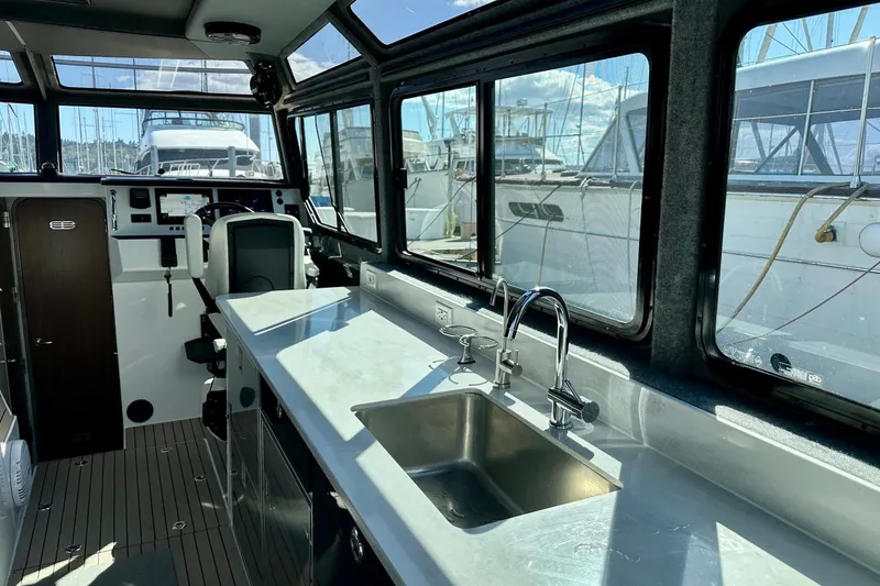 Slide: The Image of Interior of 2023 Life Proof 41 full cabin boat with modern kitchen amenities. - 20