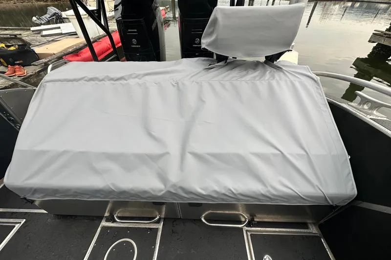 Slide: The Image of 2023 Life Proof 41 full cabin boat with covered seating area and dual outboard motors. - 37