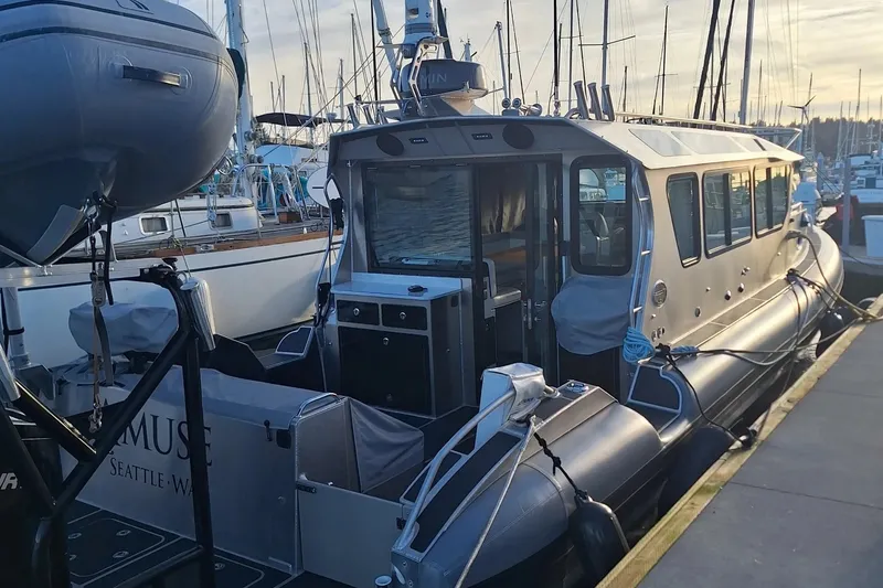 Slide: The Image of 2023 Life Proof 41 full cabin boat docked at marina, featuring sleek design and modern amenities. - 4