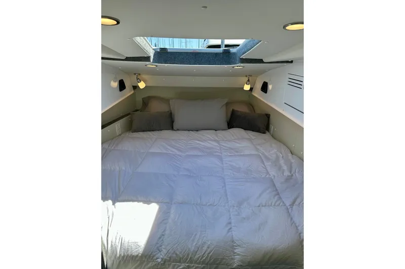 Slide: The Image of Interior cabin of 2023 Life Proof 41 full cabin boat with skylight and cozy bedding. - 31