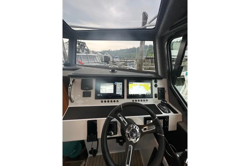 Slide: The Image of Interior view of 2023 Life Proof 41 full cabin boat with navigation screens. - 43