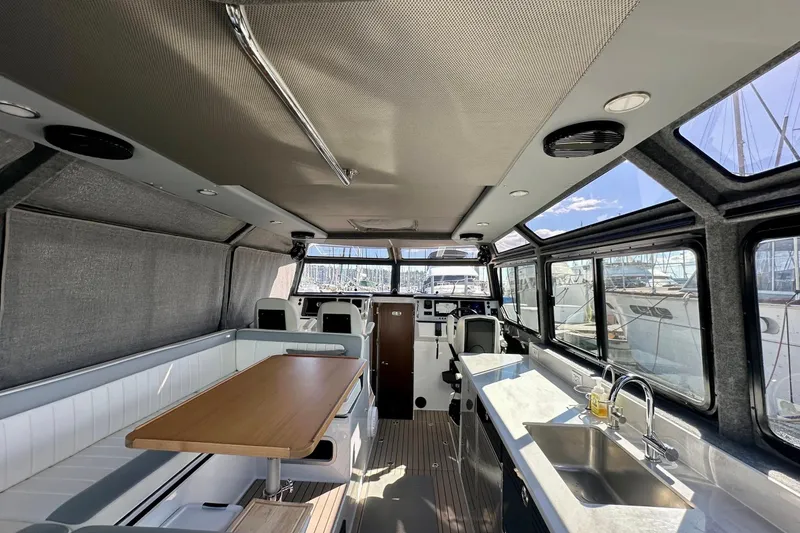 Slide: The Image of Interior of 2023 Life Proof 41 full cabin boat with modern amenities and seating. - 15