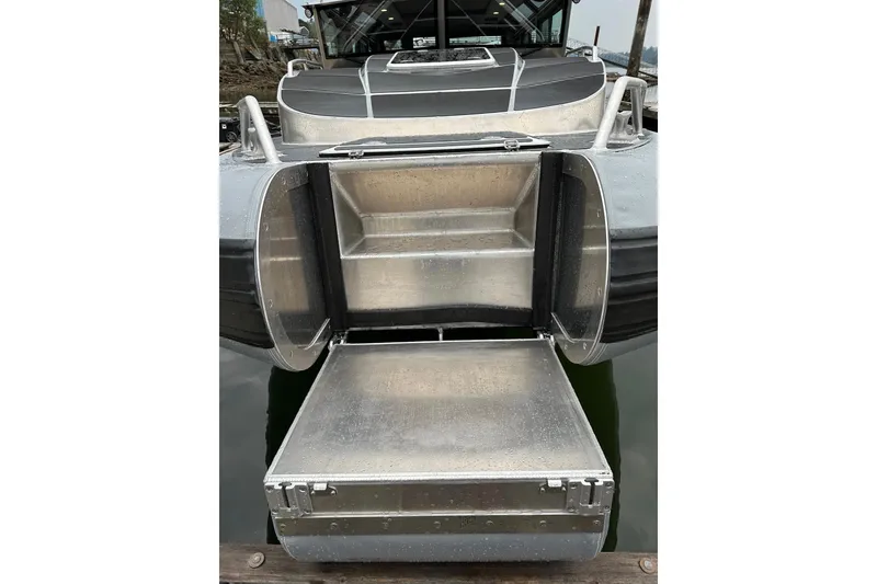 Slide: The Image of 2023 Life Proof 41 full cabin boat with open storage compartment at the stern. - 46