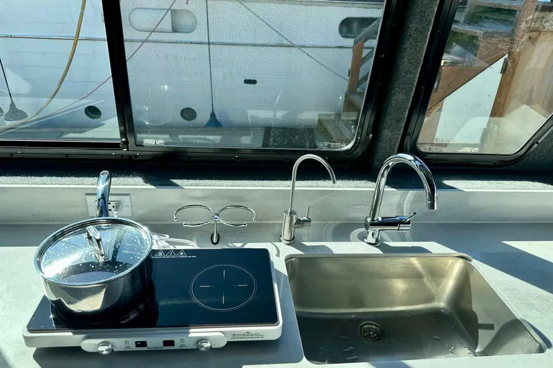 Slide: The Image of Modern kitchen setup in 2023 Life Proof 41 full cabin boat. - 19