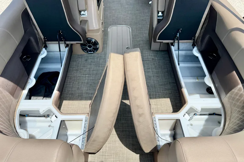 Slide: The Image of Interior view of a 2027 Vanderbilt 700T boat showcasing spacious under-seat storage compartments. - 28