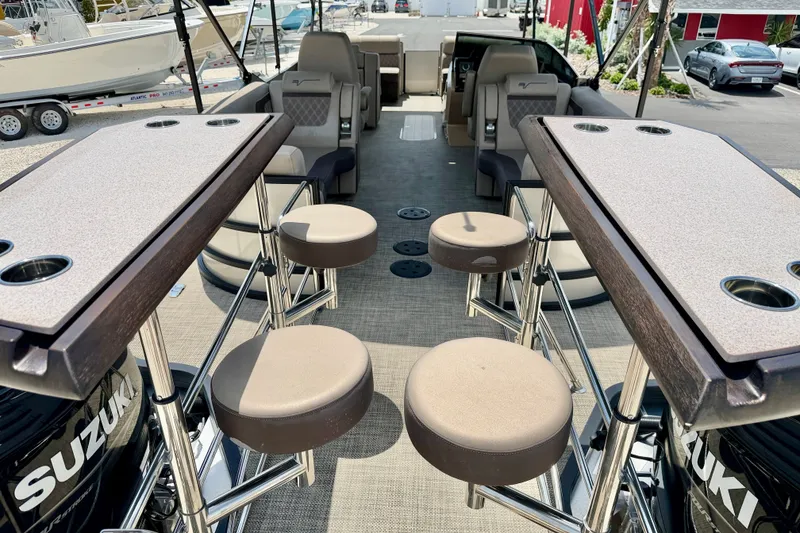 Slide: The Image of Luxury interior of 2027 Vanderbilt 700T boat with seating and tables. - 18