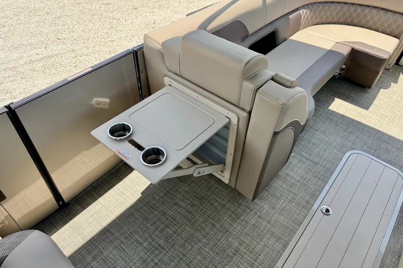 Slide: The Image of Luxurious interior of 2027 Vanderbilt 700T boat with foldable table and cup holders. - 15