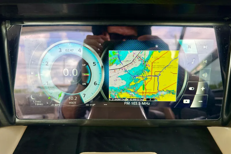 Slide: The Image of Vanderbilt 700T 2027 dashboard display with navigation and speedometer interface. - 25