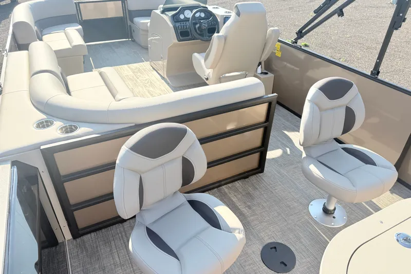 Slide: The Image of 2026 Bentley Pontoons Fish 220 Fish-N-Cruise interior with plush seating and modern dashboard. - 23