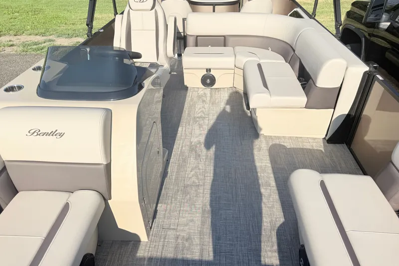 Slide: The Image of 2026 Bentley Pontoons Fish 220 Fish-N-Cruise interior with beige seating and helm. - 14