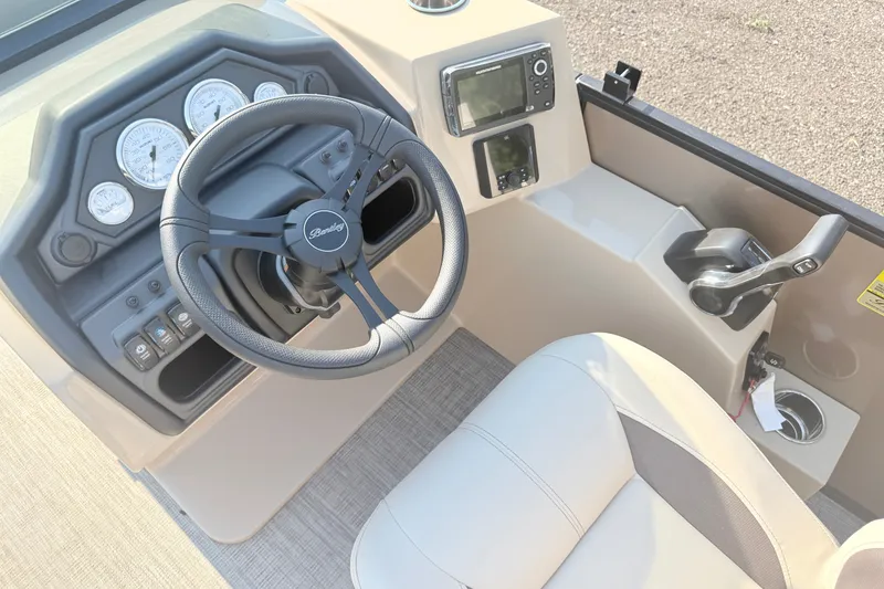 Slide: The Image of 2026 Bentley Pontoons Fish 220 Fish-N-Cruise dashboard with steering wheel and controls. - 18