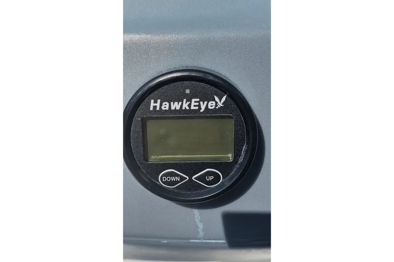 Slide: The Image of HawkEye display on 2022 Tahoe T16 boat dashboard with up and down buttons. - 12