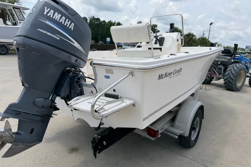 Slide: The Image of 2005 McKee Craft Marathon 172 CC boat with Yamaha outboard motor on trailer. - 3