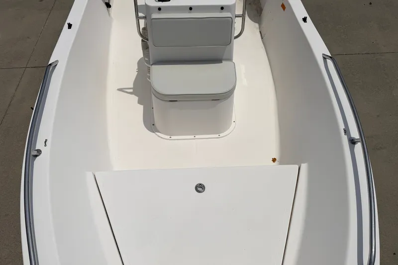 Slide: The Image of 2005 McKee Craft Marathon 172 CC boat interior with seating and storage. - 14