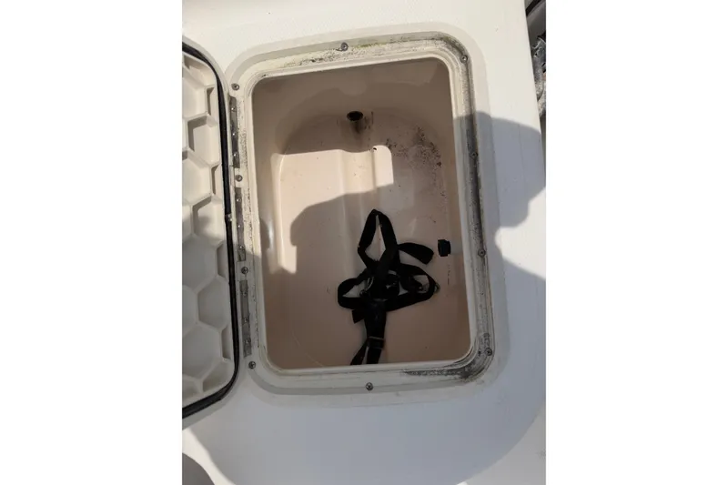 Slide: The Image of Open storage compartment on 2005 McKee Craft Marathon 172 CC boat. - 13
