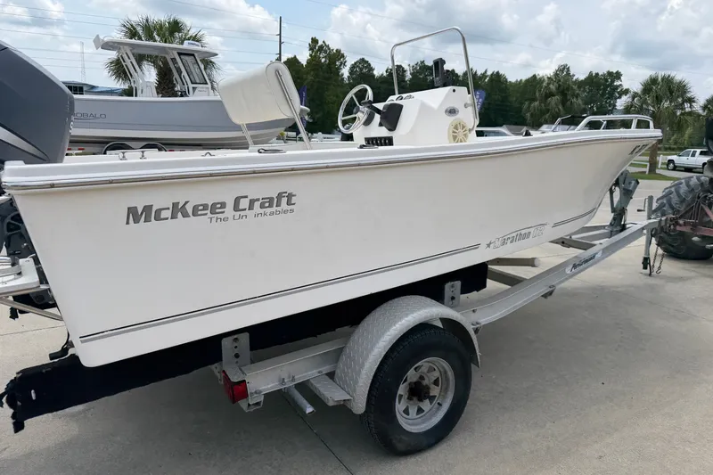 Slide: The Image of 2005 McKee Craft Marathon 172 CC boat on trailer, side view. - 4