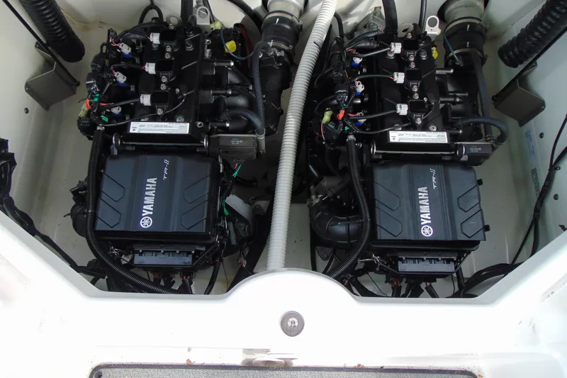 Slide: The Image of 2018 Yamaha Boats SX210 engine compartment with dual TR-1 engines. - 16