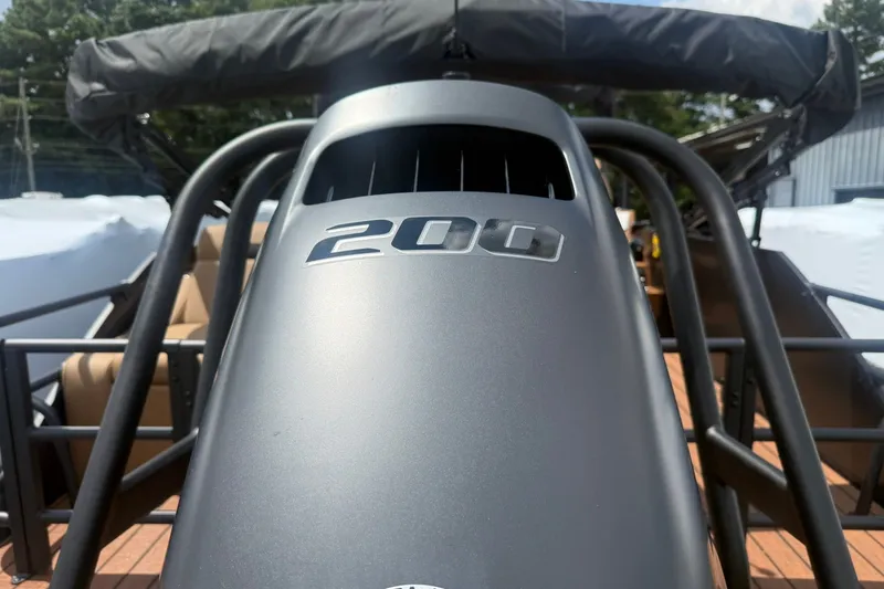Slide: The Image of 2026 Bentley Pontoons Legacy 223 Swingback with 200 horsepower engine, close-up view. - 18