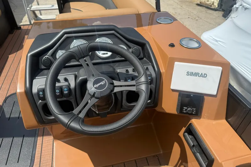 Slide: The Image of Steering console of 2026 Bentley Pontoons Legacy 223 Swingback with Simrad display. - 8