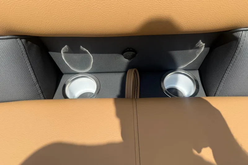 Slide: The Image of Cup holders and USB port in Bentley Pontoons Legacy 223 Swingback, 2026 model. - 11