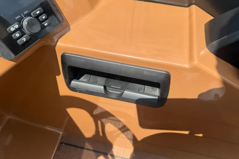Slide: The Image of Control panel of 2026 Bentley Pontoons Legacy 223 Swingback with storage compartment. - 10
