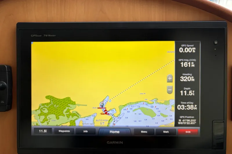 Slide: The Image of Garmin GPS display on 2015 Sabre 38 Salon Express, showing navigation map and data. - 43