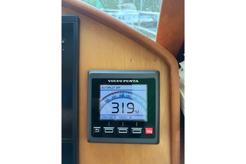 Slide: The Image of Volvo Penta autopilot display on 2015 Sabre 38 Salon Express yacht dashboard. - 44