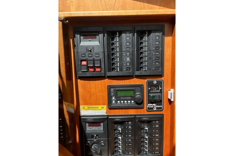 Slide: The Image of Electrical control panel on a 2015 Sabre 38 Salon Express yacht. - 51