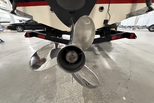 Slide: The Image of 2023 Rossiter 23 boat propeller in a garage setting. - 21