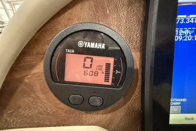 Slide: The Image of Yamaha tachometer displaying 608 hours on a Rossiter 23, 2023 model dashboard. - 15