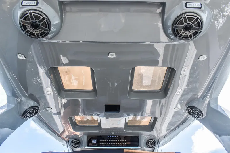 Slide: The Image of The image shows the roof of a 2022 Deep Impact 399 Forward Cabin with speakers and windows. - 13